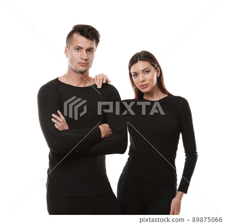 Couple wearing thermal underwear isolated on white Couple wearing thermal underwear isolated on white 89875066