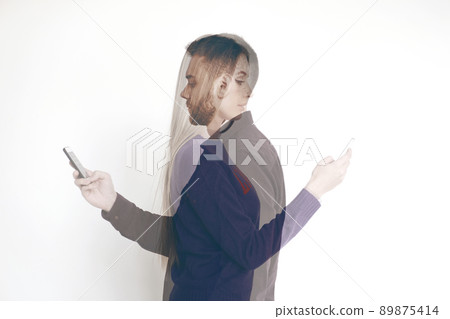 Portrait of young woman and handsome bearded man using their smartphones on white background, double exposure Portrait of young woman and handsome bearded man using their smartphones on white background, double exposure 89875414