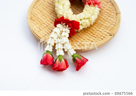 Rose with crown flower and jasmine garland 89875566