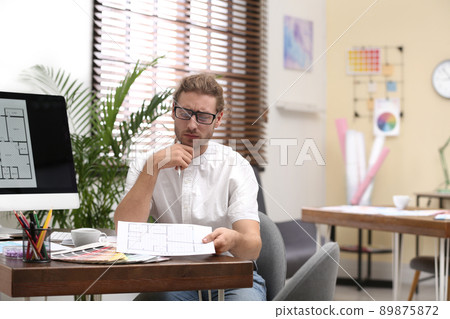 Professional interior designer at workplace in office 89875872