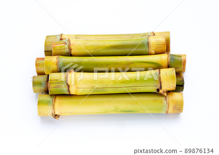 Sugar cane on white background. Sugar cane on white background. 89876134