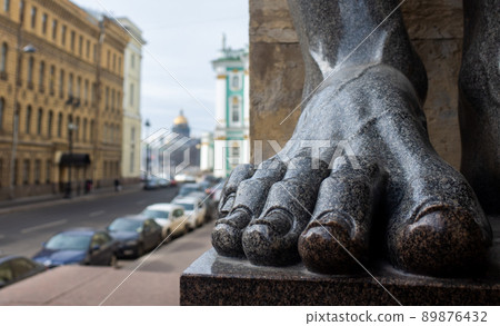 Russia Feet of the Atlantean sculpture of the portico of the New Hermitage building on Millionnaya street in Saint Petersburg. 89876432