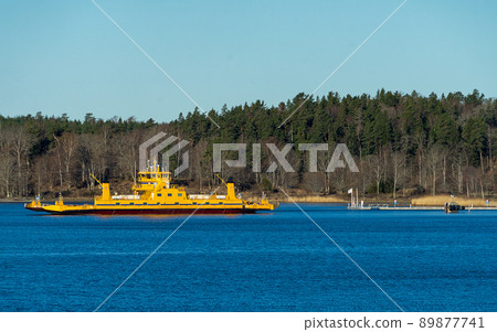 Yellow ferry for transporting cars and people from the islands of the Stockholm archipelago to the mainland 89877741