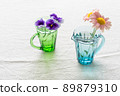Spring flowers on the table 89879310