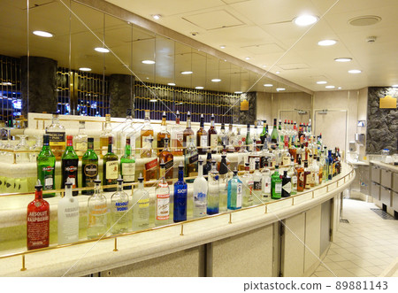 Bottle at the bar counter of a passenger ship Bottle at the bar counter of a passenger ship 89881143