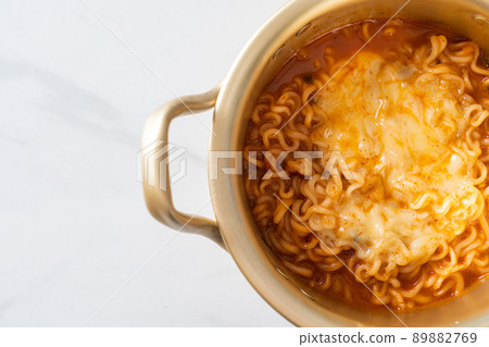 Korean spicy instant noodle with cheese 89882769