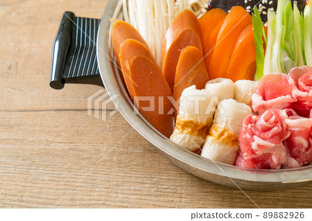Budae Jjigae or Budaejjigae (Army stew or Army base stew). It is loaded with Kimchi, spam, sausages, ramen noodles and much more Budae Jjigae or Budaejjigae (Army stew or Army base stew). It is loaded with Kimchi, spam, sausages, ramen noodles and much more 89882926