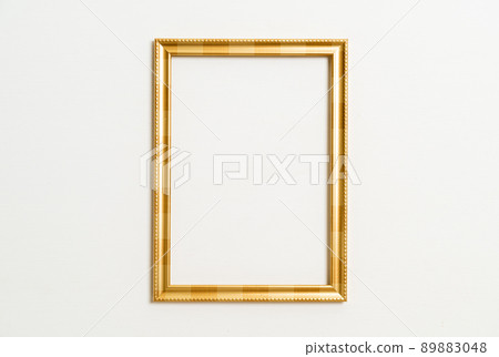 empty picture frame on white wall background 89883048