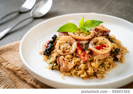 Basil and Spicy Herb Fried Rice with Squid or Octopus Basil and Spicy Herb Fried Rice with Squid or Octopus 89883368