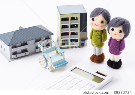 Wheelchairs, houses and senior couples (craft) Wheelchairs, houses and senior couples (craft) 89883724