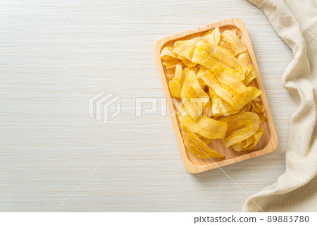 Banana Chips - fried or baked sliced banana Banana Chips - fried or baked sliced banana 89883780