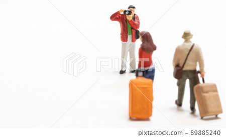 Photographer taking pictures of two men and women traveling 89885240