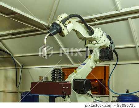 Robots welding in parts industry 89886723