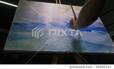 Artist copyist paint seascape with ship in ocean. Craftsman decorator draw as boat sail on blue sea with acrylic oil color. Artist copyist paint seascape with ship in ocean. Craftsman decorator draw as boat sail on blue sea with acrylic oil color. 89889191