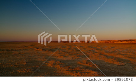 Panorama view to Plateau Ustyurt from the edge of Aral sea near Aktumsuk cape at sunset, Karakalpakstan, Uzbekistan Panorama view to Plateau Ustyurt from the edge of Aral sea near Aktumsuk cape at sunset, Karakalpakstan, Uzbekistan 89891078