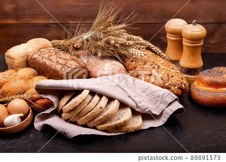 Different types of bread. Bakery concept. Ingredients for baking Different types of bread. Bakery concept. Ingredients for baking 89891573