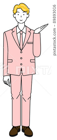 A cute man in a suit who is pointing his finger with a smile and introducing him. A cute man in a suit who is pointing his finger with a smile and introducing him. 89893016