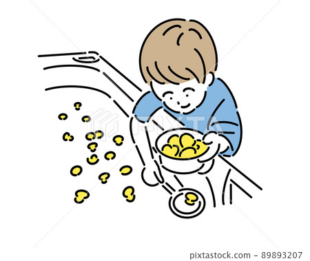 A boy scooping ducks at a festival A boy scooping ducks at a festival 89893207