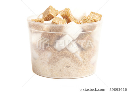 Cube of brown and white sugar in a plastic box isolated on white background 89893616