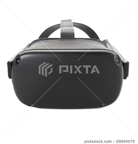 Close-up of VR glasses isolated on white background. Front view. Virtual reality helmet for gaming, entertainment and learning. Close-up of VR glasses isolated on white background. Front view. Virtual reality helmet for gaming, entertainment and learning. 89894079