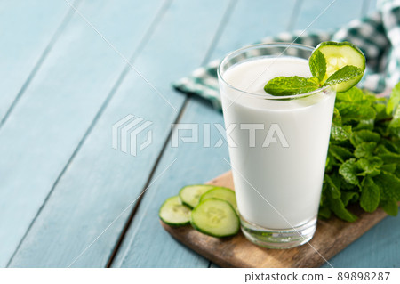 Ayran drink with mint and cucumber in glass 89898287