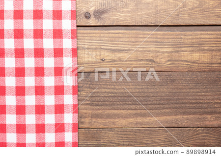 Rustic wooden and red checkeredbackground. 89898914