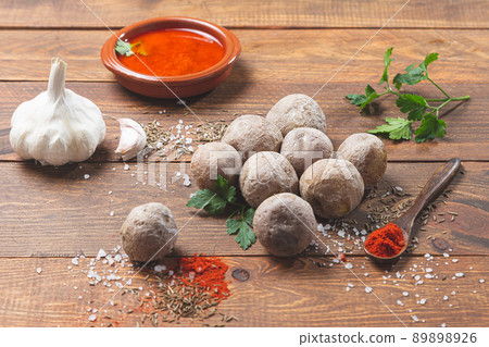 Papas arrugadas con mojo . Typical canarian dish, potatoes with mojo picon. Typical Spanish and Canarian tapas concept . Papas arrugadas con mojo . Typical canarian dish, potatoes with mojo picon. Typical Spanish and Canarian tapas concept . 89898926