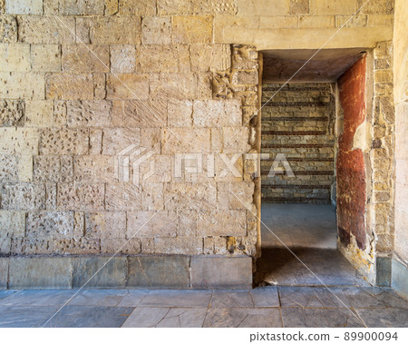 Bricks stone wall with opening revealing vacant room with bricks wall Bricks stone wall with opening revealing vacant room with bricks wall 89900094