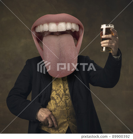 Contemporary art collage. Man in vintage costume and giant mouth head rising glass of foamy lager beer isolated on dark background. Cheers 89900392