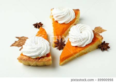 Pieces of pumpkin pie on white background, close up 89900998
