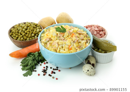 Olivier salad and ingredients isolated on white background Olivier salad and ingredients isolated on white background 89901155