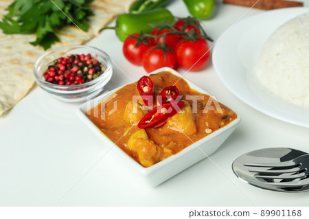 Concept of tasty food with chicken tikka on white background Concept of tasty food with chicken tikka on white background 89901168