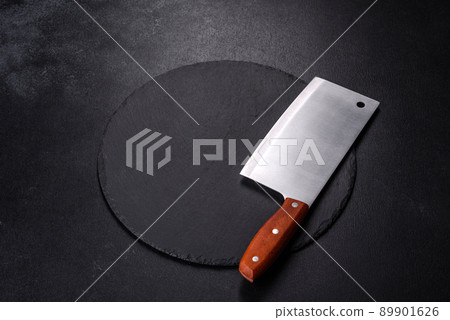 Black plate on a black background. Flat lay, top view, copy space Black plate on a black background. Flat lay, top view, copy space 89901626