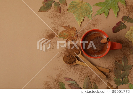 Concept of tasty drink with cocoa on beige background 89901773