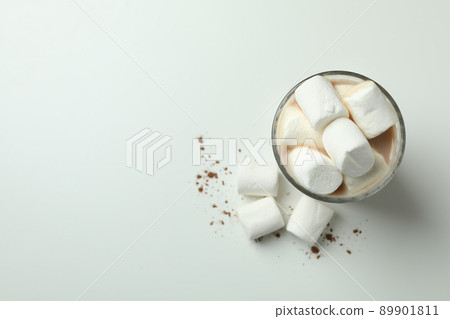 Cocoa with marshmallows in glass on white background 89901811
