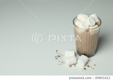 Cocoa with marshmallows in glass on white background 89901812