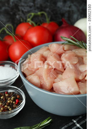 Concept of tasty food with slices of raw chicken fillet, close up Concept of tasty food with slices of raw chicken fillet, close up 89902580