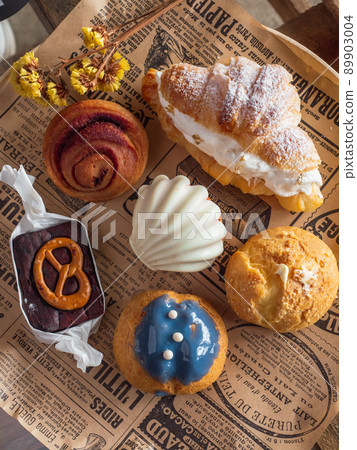 The group of bakery on the wooden tray. The group of bakery on the wooden tray. 89903004
