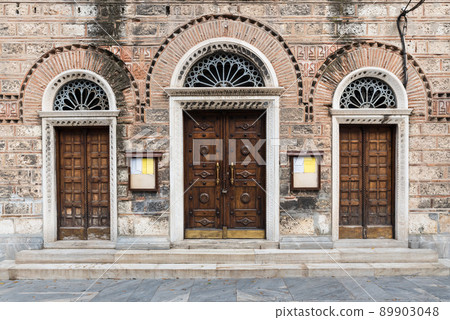 Athens Old Town, Attica, Greece - View over the facade of a traditional small monestary Athens Old Town, Attica, Greece - View over the facade of a traditional small monestary 89903048
