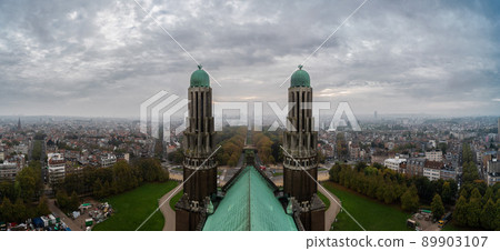 Koekelberg, Brussels Capital Region - Belgium -  Panoramic view over Brussels, a colorful sky and the towers of the Basilica 89903107