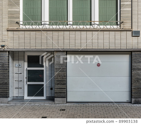 Jette, Brussels Capital Region -Belgium - window and garage port in a residential area Jette, Brussels Capital Region -Belgium - window and garage port in a residential area 89903138