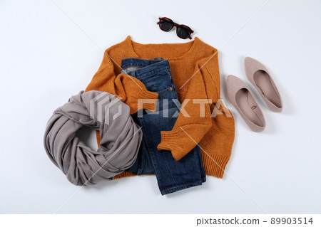 Autumn style clothes on white background, top view Autumn style clothes on white background, top view 89903514