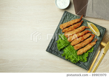 Concept of tasty food with deep-fried shrimp on dark table Concept of tasty food with deep-fried shrimp on dark table 89903970