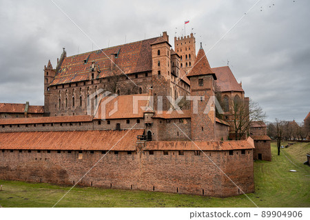 The Castle of the Teutonic Order in Malbork in the Pomerania region, Poland. This is the largest castle in the world measured by land area and a UNESCO World Heritage Site 89904906