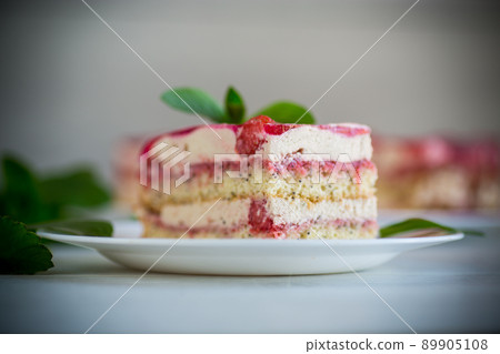 strawberry poppy cake with cream in a plate strawberry poppy cake with cream in a plate 89905108