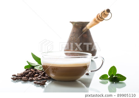 Cup of coffee latte with heart shape and coffee beans Cup of coffee latte with heart shape and coffee beans 89905110