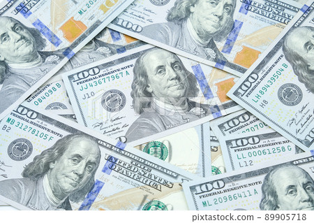 Pile of One hundred dollars banknotes pattern. The official currency of the United States of America. Pile of One hundred dollars banknotes pattern. The official currency of the United States of America. 89905718