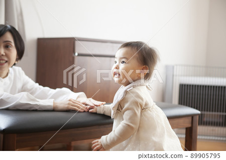 Baby standing up Baby standing up 89905795