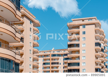 Fragments of the facades of modern multi-storey residential complexes. Fragments of the facades of modern multi-storey residential complexes. 89905891
