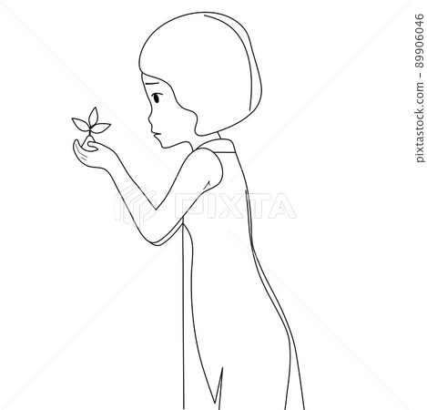 The girl is holding a plant in her hands. The concept of peace, ecology and childhood protection. The girl is holding a plant in her hands. The concept of peace, ecology and childhood protection. 89906046